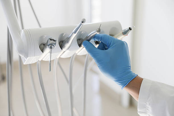 Professional Emergency Dentist technician working in Hinton, OK